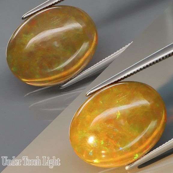 Smoldering! Huge! 7.30ct low profile semi-black Opal! From Ethiopia!