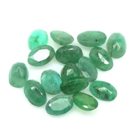 Oval cut 6.31ct real Zambian Emerald set