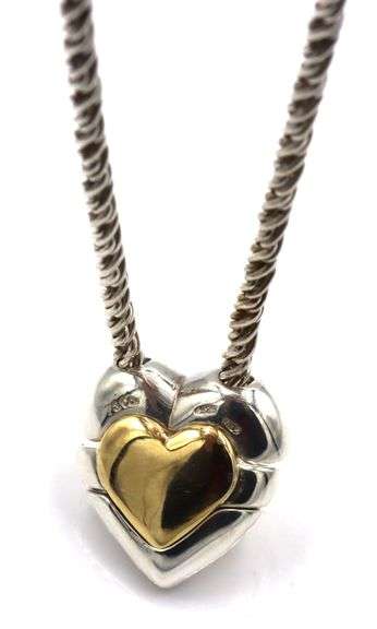 Tiffany & Co puzzle heart necklace