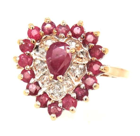 10kt Yellow gold pear shaped and round ruby and diamond accent ring