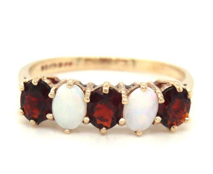 9kt Yellow gold oval opal and garnet 5 stone ring