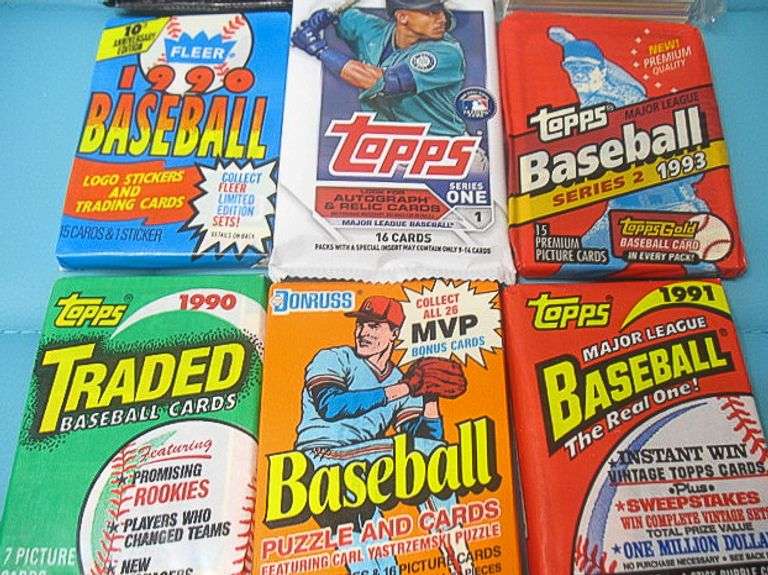 9 UNOPENED PACKS OF BASEBALL CARDS
