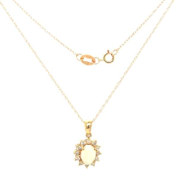 14kt Yellow gold oval opal and diamond halo pendant on chain