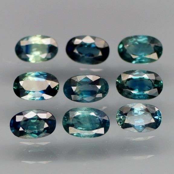 Heated only! 3.28ct blue green Sapphire set