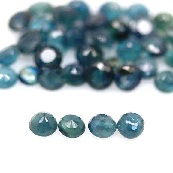 Heated only! 7.76ct blue green Sapphire set