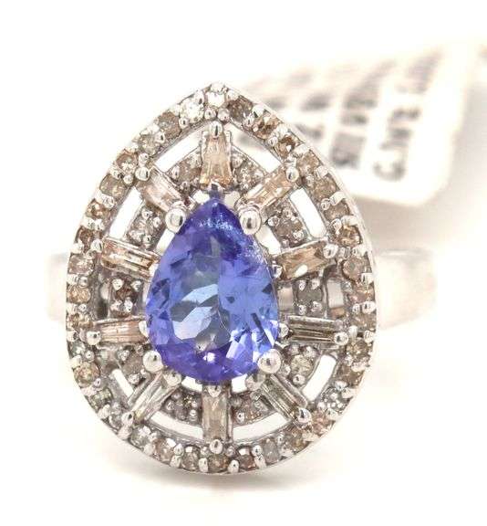 Elegant 1.17CTS Pear Shaped Tanzanite and 0.40CTW Diamond Ring in 14KT White Gold Over Sterling Silv