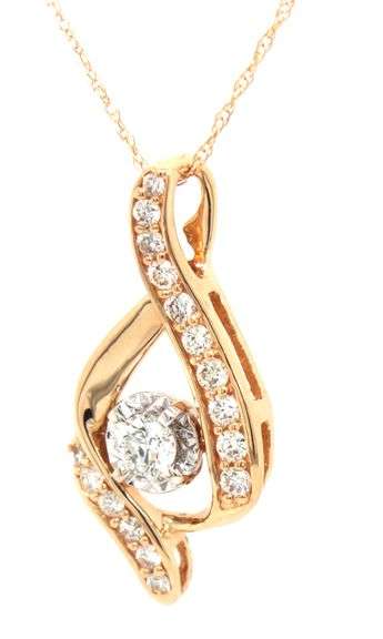 14kt Yellow gold 3/8ctw diamond swirl pendant on chain