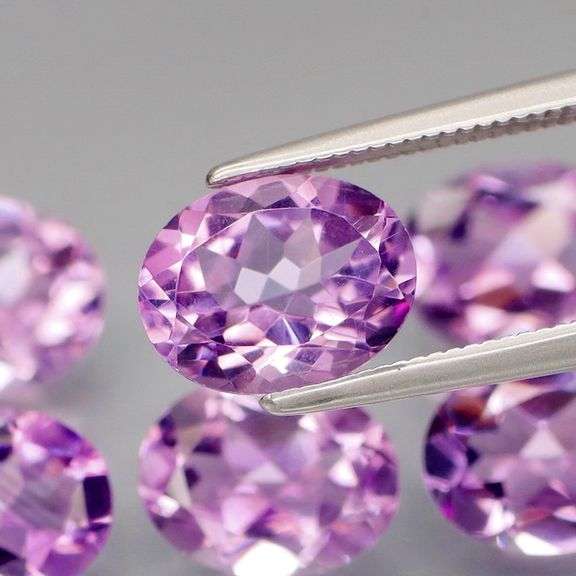 Glittering 9.80ct oval cut Bolivian Amethyst set