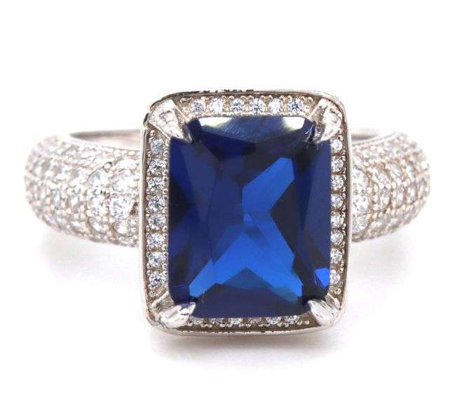 Emerald cut blue cubic zirconia and white CZ ring in 925 sterling silver