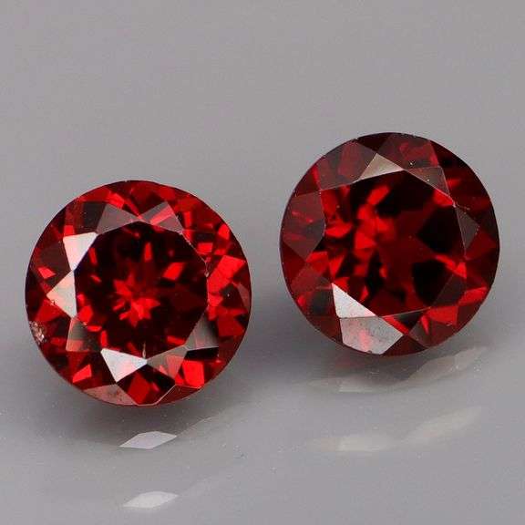 Mozambique red! 4.67ct matched round cut Garnet pair!