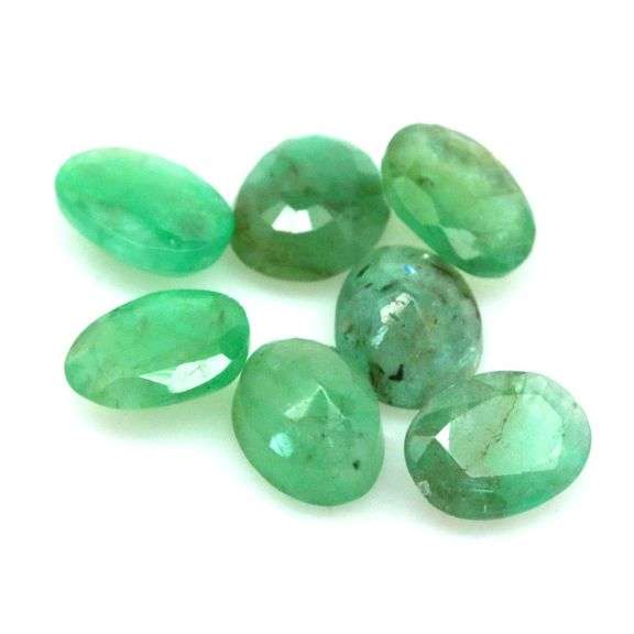 Rich emerald green 8.97ct 7pc Emerald set