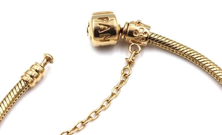 14kt Yellow gold Pandora bracelet with 10 charms