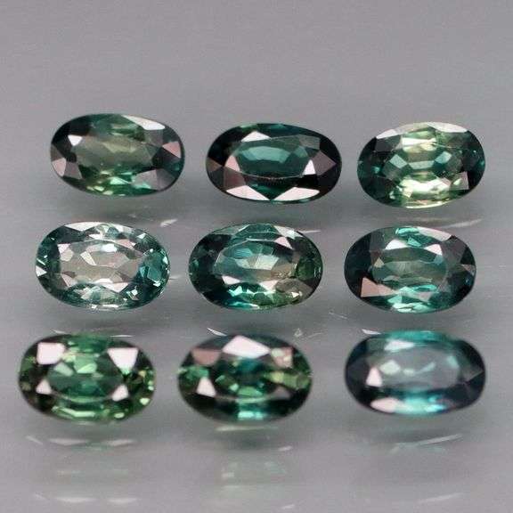 Heated only! 3.10ct blue green Australian Sapphire set