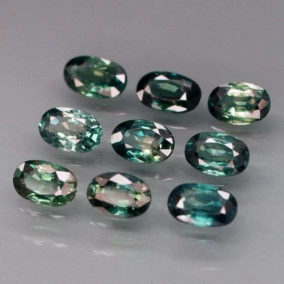 Heated only! 3.10ct blue green Australian Sapphire set