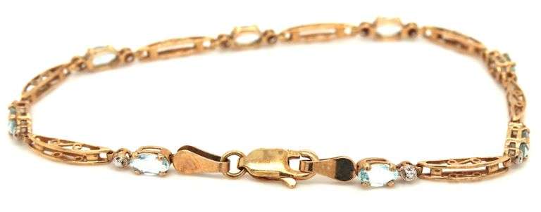 10kt Yellow gold blue topaz link bracelet