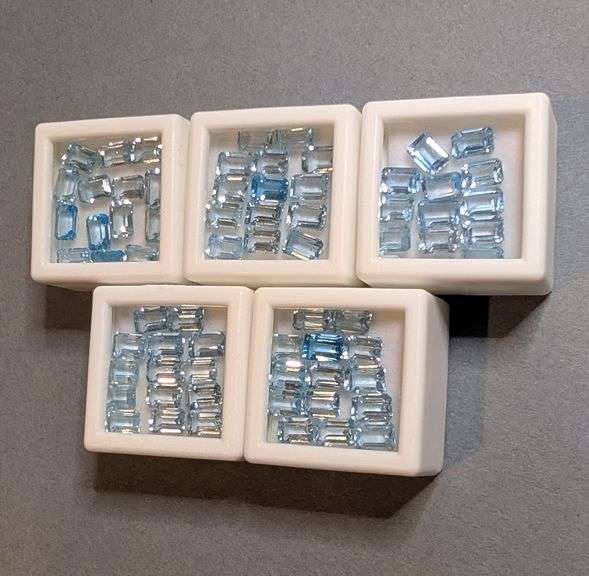 Large 51.56ct set of platinum blue emerald cut Topaz!
