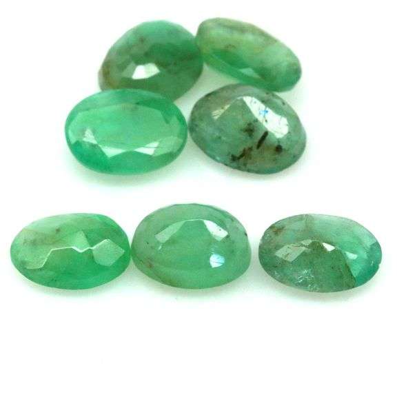 Rich emerald green 8.97ct 7pc Emerald set