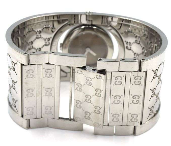 Gucci twirl watch with GG band