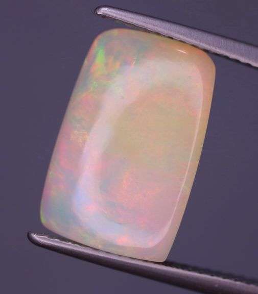 Phenomenal full spectrum flashing 4.81ct semi-black Opal