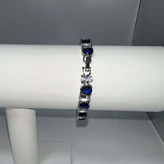 18 Kt White Gold Plated Huge 32.5 Ctw Simulated Diamond and Midnight Blue Sapphire Tennis Bracelet