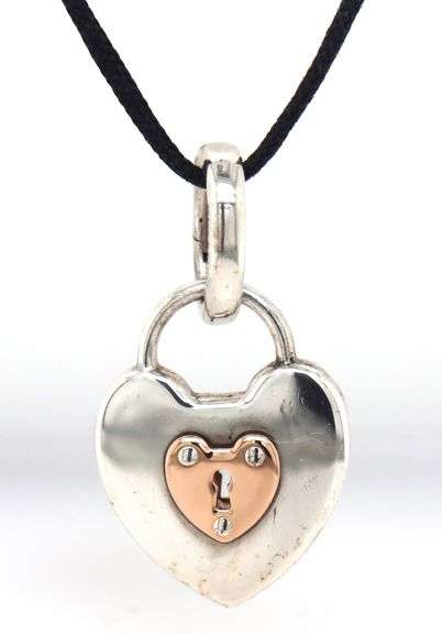 Tiffany & Co two tone Padlock pendant on black cord necklace