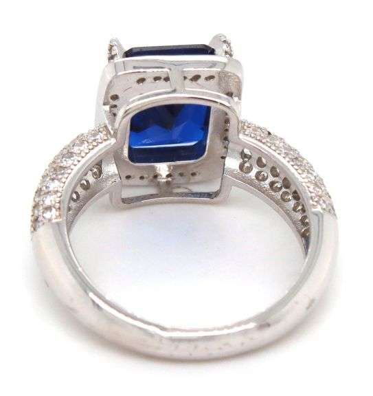 Emerald cut blue cubic zirconia and white CZ ring in 925 sterling silver
