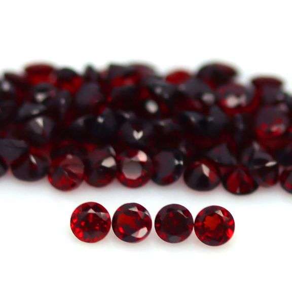 Superb 12.10ct diamond cut red amber Mozambique Garnet set