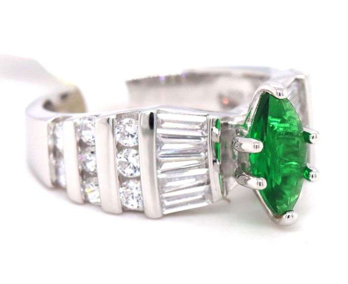 Green marquise and white round and baguette cubic zirconia ring