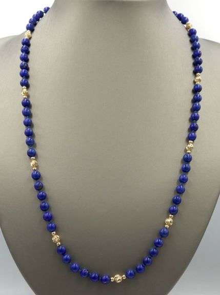 Lapis and gold beads station necklace