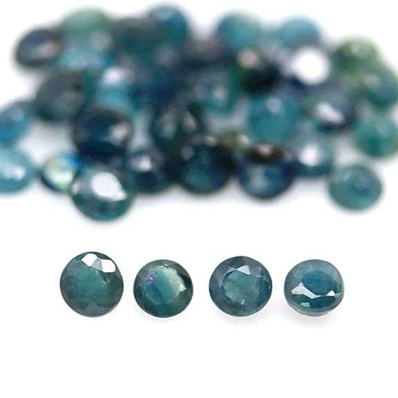 Heated only! 7.76ct blue green Sapphire set