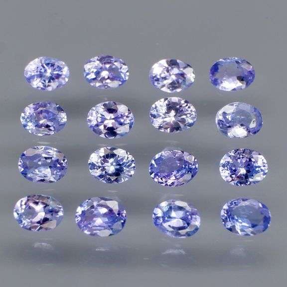 Heavy flashing 2.83ct oval cut Tanzanite set