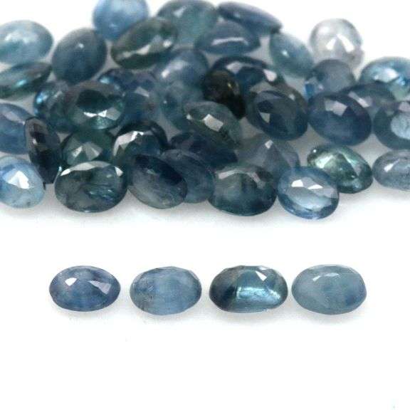 Eye catching 7.44ct denim blue Sapphire set