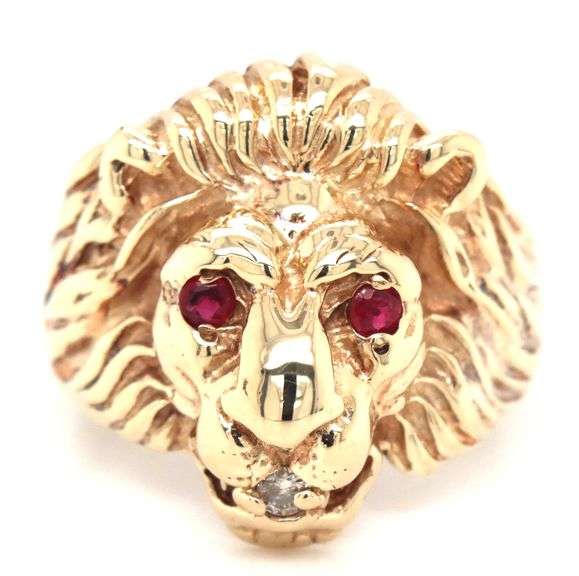 10kt Yellow gold Lion head ring with ruby eyes and diamonds