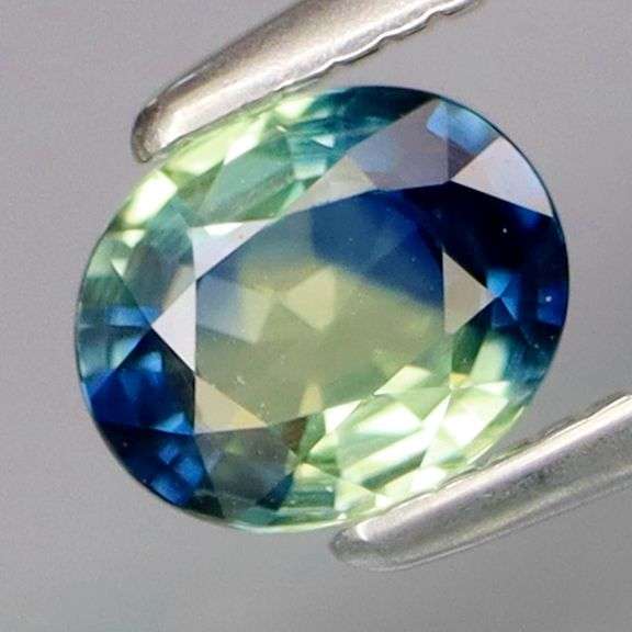 Strong color seperation! .52ct blue and yellow Parti Sapphire! Heated only!