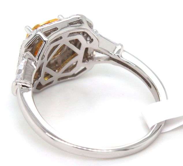 Yellow cushion cut and white round and baguette cubic zirconia ring in 925 sterling silver