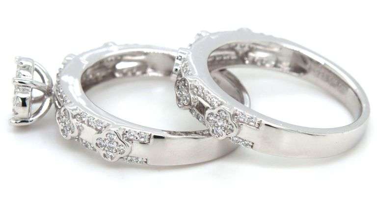 Set of 925 sterling silver flower style white cubic zirconia ring