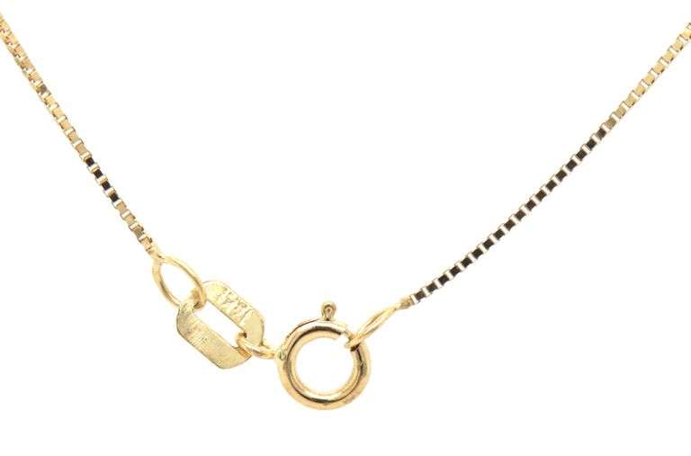 14kt Yellow gold ruby and diamond circle pendant on chain