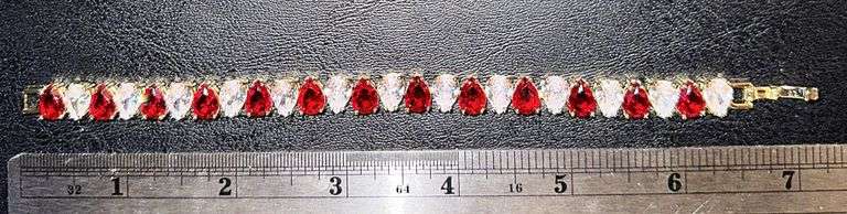 18 Kt Yellow Gold Plated Huge 32.5 Ctw Simulated Diamond and Ruby Tennis Bracelet