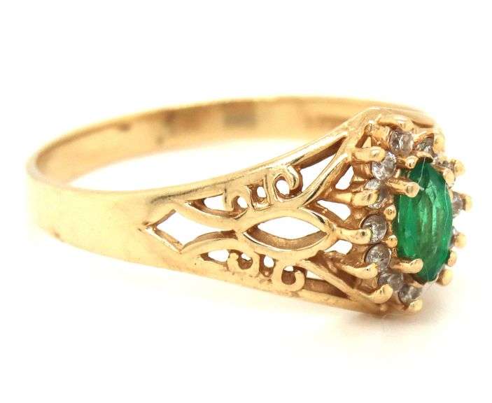 14kt Yellow gold marquise emerald and diamond ring