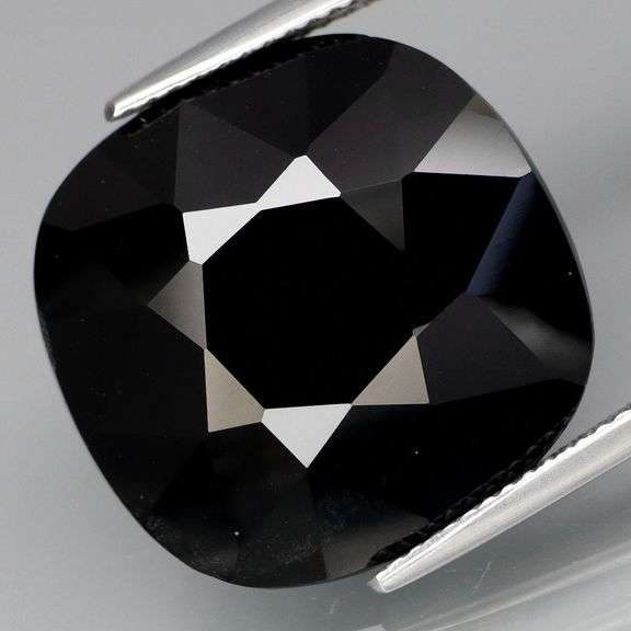 Huge collectors piece! 22.21ct silky black Loas Tektite