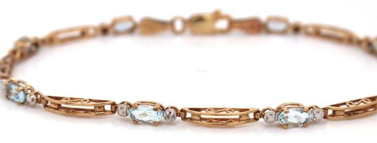 10kt Yellow gold blue topaz link bracelet