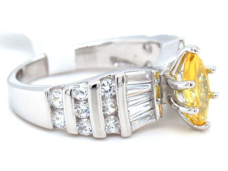 Yellow Marquise and white round and baguette cubic zirconia ring in 925 sterling silver