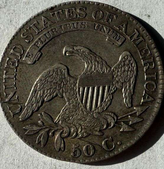 1825 Double Profile Bust Half Dollar