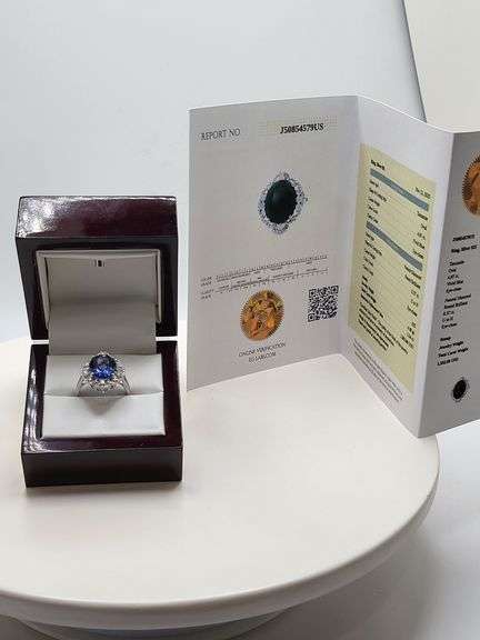 Very fine Tanzanite 5.34 ctw with diamond accent set in silver ring, EGL certified