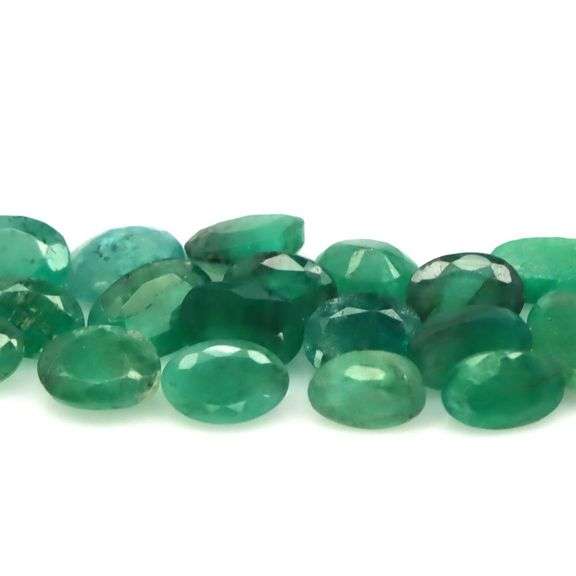 Rich emerald green 9.68ct 20pc Emerald set