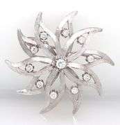 Vintage 14kt White gold 1.25ctw diamond star brooch