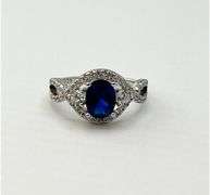 925 Sterling Silver Oval Blue Center Stone With Crystal Pave Details Ring