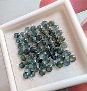 Heated only! 8.58ct blue green Sapphire set