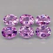 Glittering 9.80ct oval cut Bolivian Amethyst set
