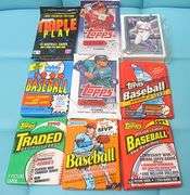 9 UNOPENED PACKS OF BASEBALL CARDS